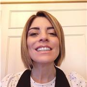 Home teacher gives English lessons to both adults and children